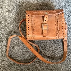 Leather Crossbody Bag. Hand Tooled!
Fully adjustable crossbody strap! 5”x6”x3.5”